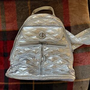 Baggallini Silver Quilted Backpack. NWOT